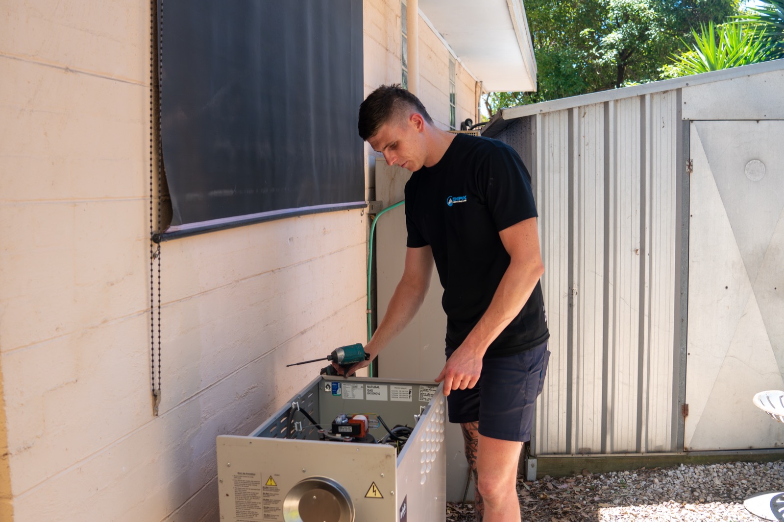 OnePeak technician installing gas ducted heating in Melbourne