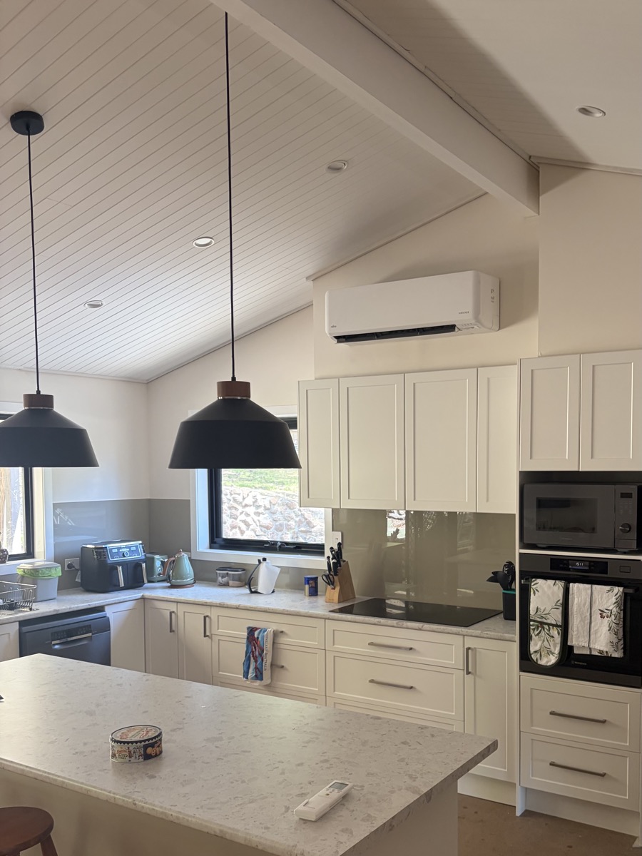 Split system air conditioner installed in kitchen